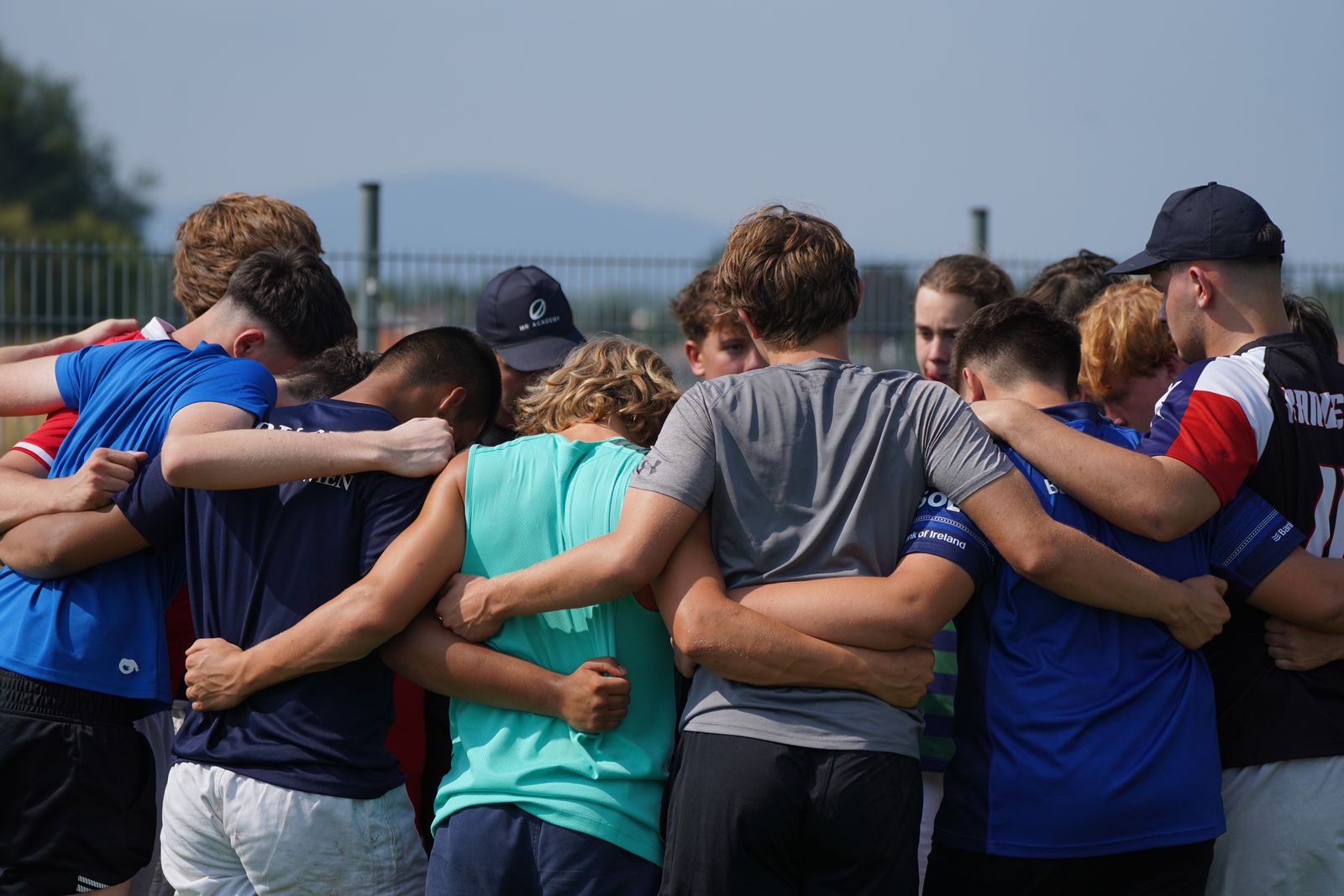 RDA camp players in a team huddle